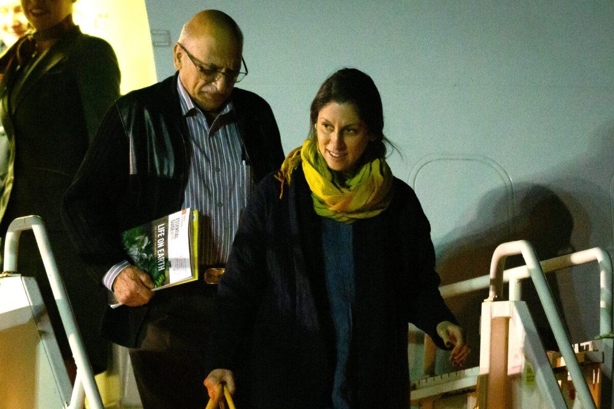 Nazanin Zaghari-Ratcliffe (R) and Anoosheh Ashoori, who were freed from Iran, disembark after landing at RAF Brize Norton, in England, on March 17, 2022. (Leon Neal/Getty Images)