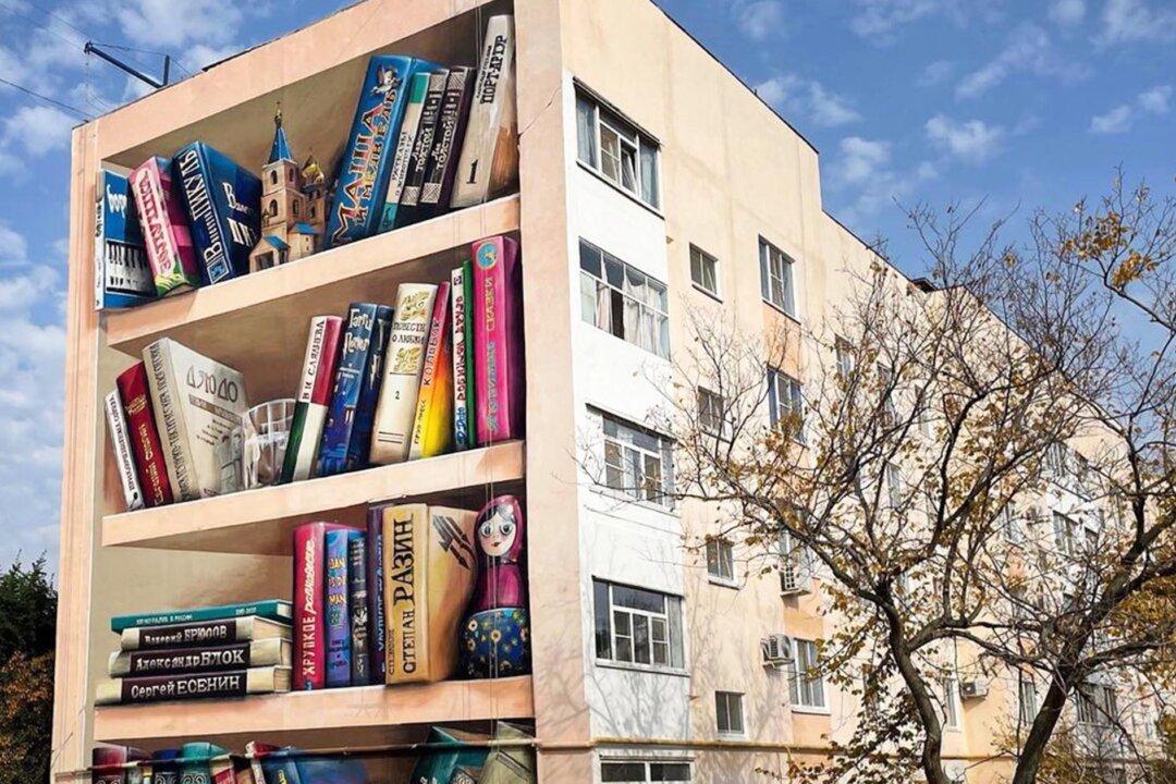 Optical Illusion Artist Transforms Dingy Soviet-Style Apartment Building Into Giant 3D Bookshelf in Russia