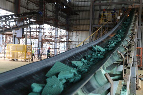 A conveyor belt carries chunks of raw cobalt after a first transformation at a plant in Lubumbashi, Democratic Republic of Congo, on Feb. 16, 2018. (Samir Tounsi/AFP via Getty Images)