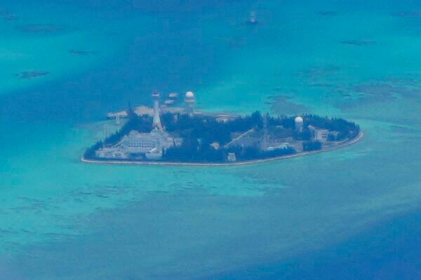 Chinese structures and buildings at the man-made island on Johnson reef at the Spratlys group of islands in the South China Sea on March 20, 2022. (AP Photo/Aaron Favila)