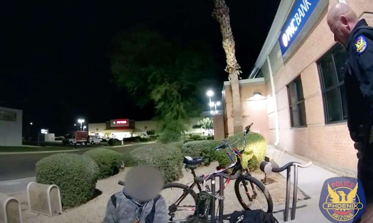 Policemen See Homeless Man With No Shoes on Cold Night, Buy Him $80 Pair With Their Own Money