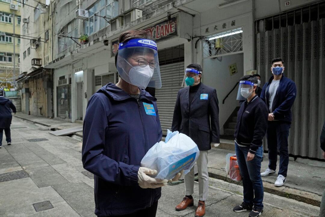 Hong Kong Urges Testing, Shanghai Struggles Under Lockdown