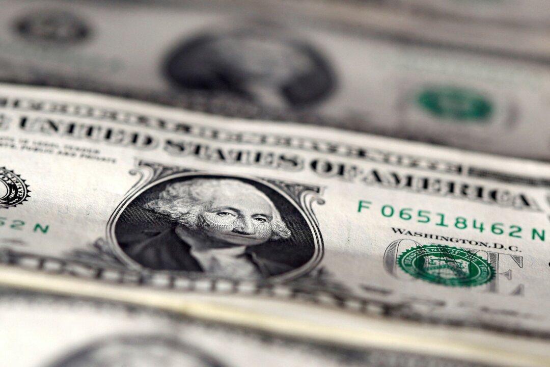 Dollar Slides Further After US Inflation Surprise