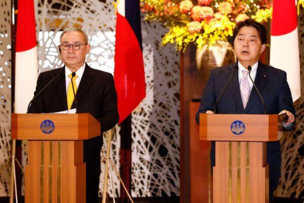 Philippines Foreign Secretary Teodoro Locsin Jr. (left) attends a press conference as part of the Japan–Philippines "2+2" talks, with Japan's Foreign Minister Yoshimasa Hayashi in Tokyo on April 9, 2022. (Rodrigo Reyes Marin AFP via Getty Images)