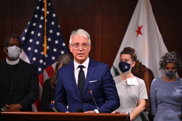 Los Angeles County District Attorney George Gascon is joined by a group of progressive district attorneys from around the country at the press conference to mark his first year in office, in Los Angeles, on Dec. 8, 2021. (Robyn Beck/AFP via Getty Images)
