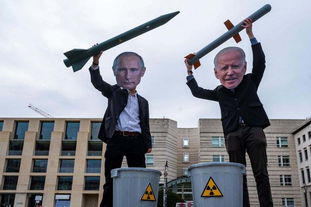 Putin Funds Fake Protests, Rattles Nukes