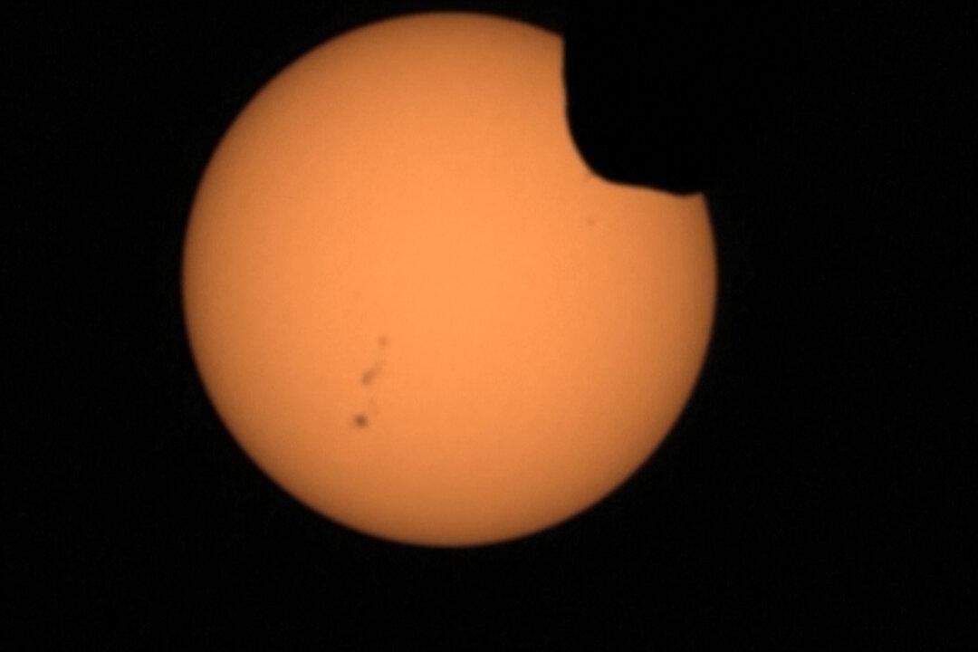 Mars Rover Captures Mars Moon Eclipsing Sun