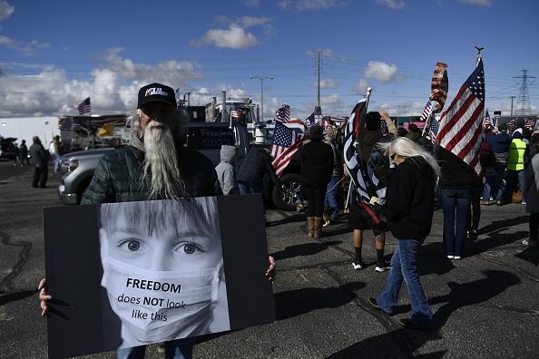 DOJ Appeals Court Decision Lifting Mask Mandate, Experts Say Move Could Backfire