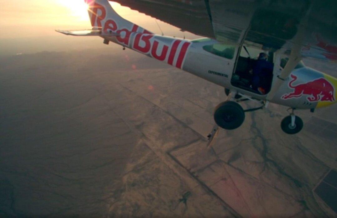Plane Crashes in Red Bull Stunt, Pilot Parachutes to Safety