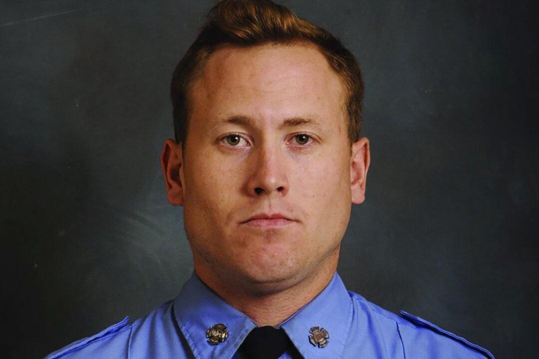 NYC Firefighter, Civilian Killed After Ceiling Partially Collapses in House Fire