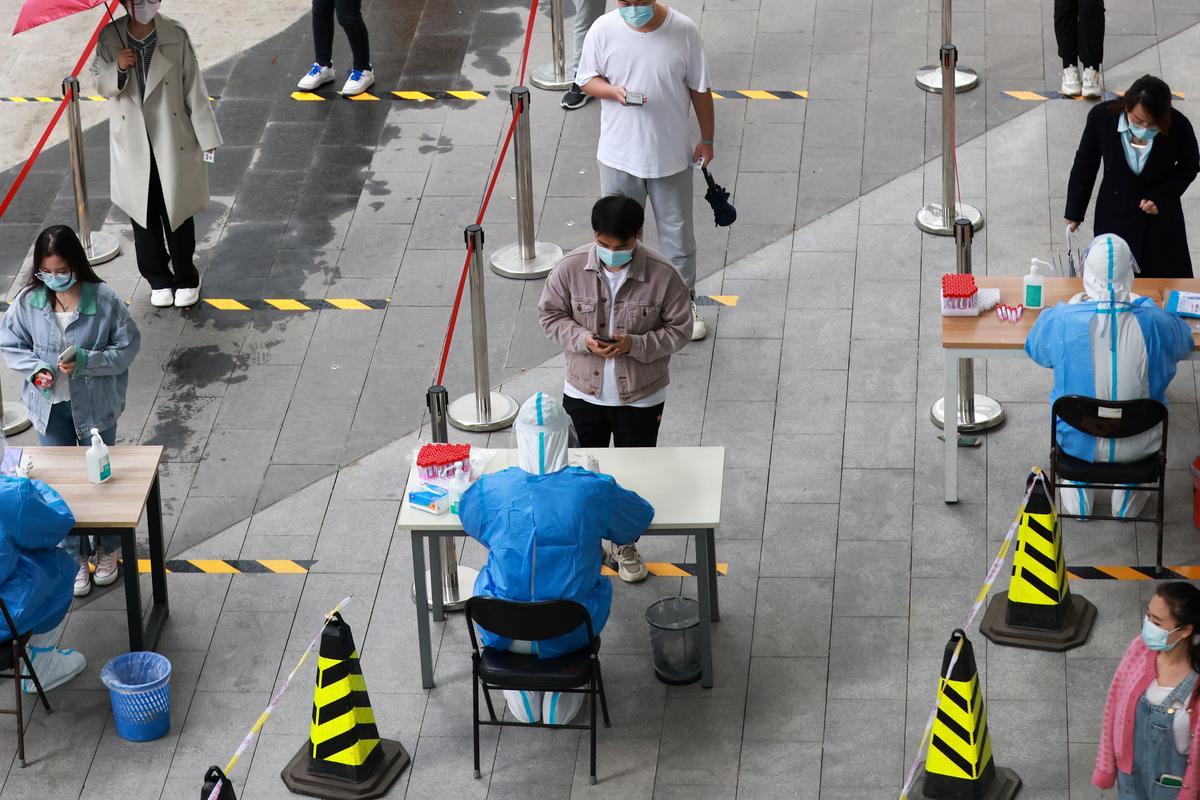 Chinese Cities Tighten Anti-Virus Curbs Amid Outbreak