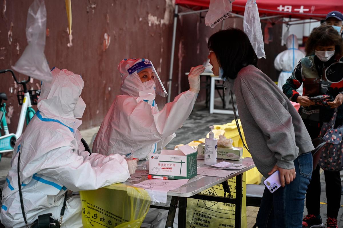 COVID-19 Testing and Isolation: No Let Up for Residents Caught in Shanghai Lockdown