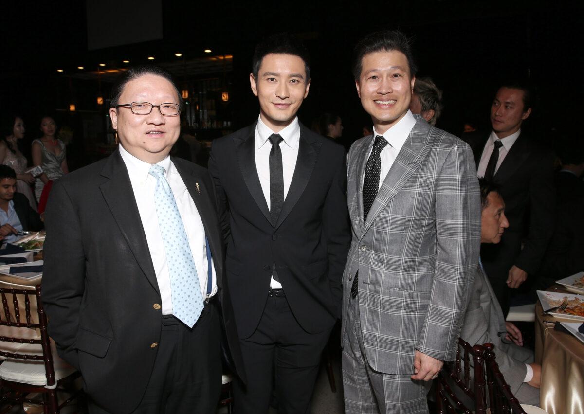 EDI Media Chairman James Su, Huang Xiaoming, and East West Bank CEO Dominic Ng (R) attend the "88th Birthday Commemoration of TCL Chinese Theater IMAX" held at the TCL Chinese Theater in Hollywood, Calif., on June 3, 2015. (Todd Williamson/Getty Images for Sun Seven Stars Media)