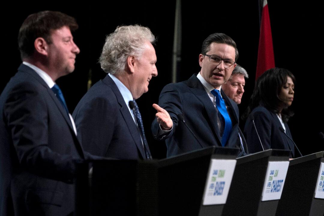 Poilievre and Charest Spar Over Trucker Convoy Protest During Leadership Debate