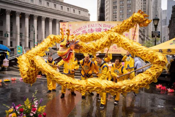 Falun Gong practitioners take part in an event to celebrate World Falun Dafa Day in Foley Square in New York City on May 7, 2022. (Samira Bouaou/The Epoch Times)