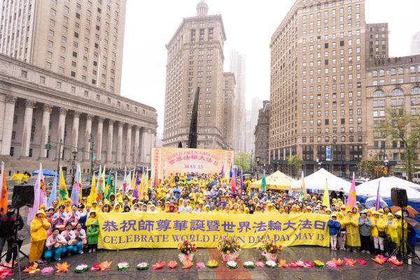 Falun Gong practitioners take part in an event to celebrate World Falun Dafa Day in Foley Square in New York City on May 7, 2022. (Larry Dye/The Epoch Times)