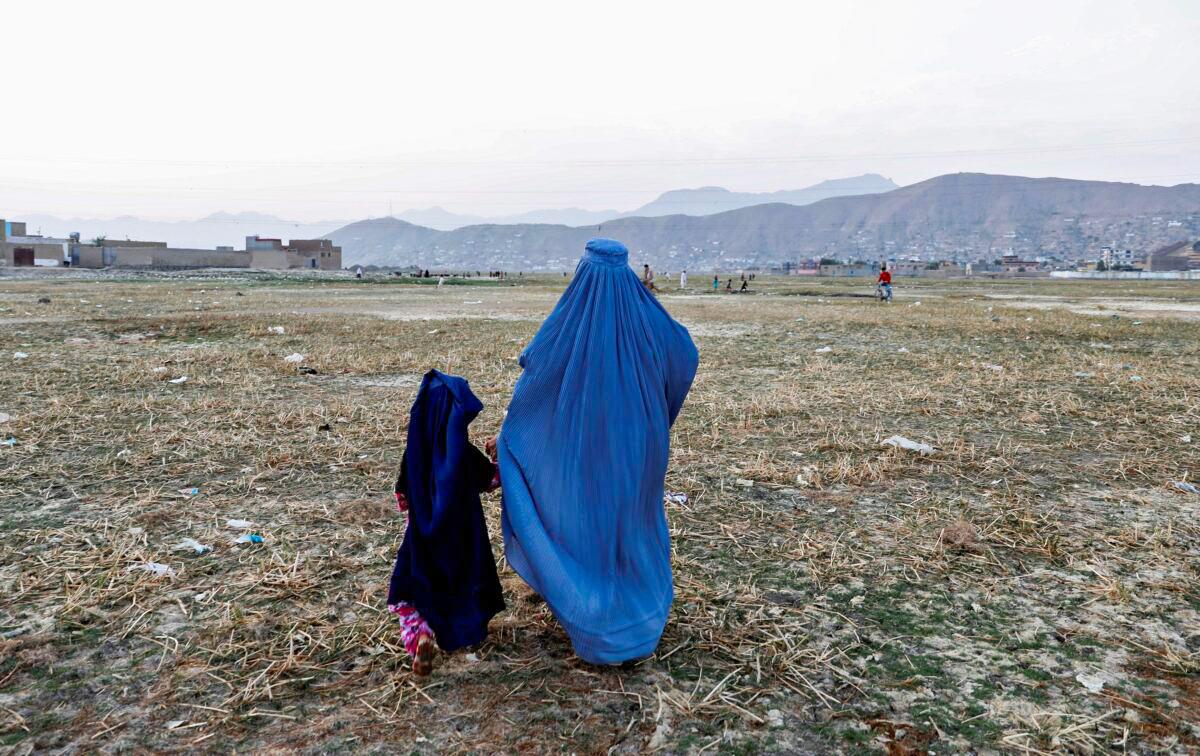 Taliban Orders Afghan Women to Cover Faces Again