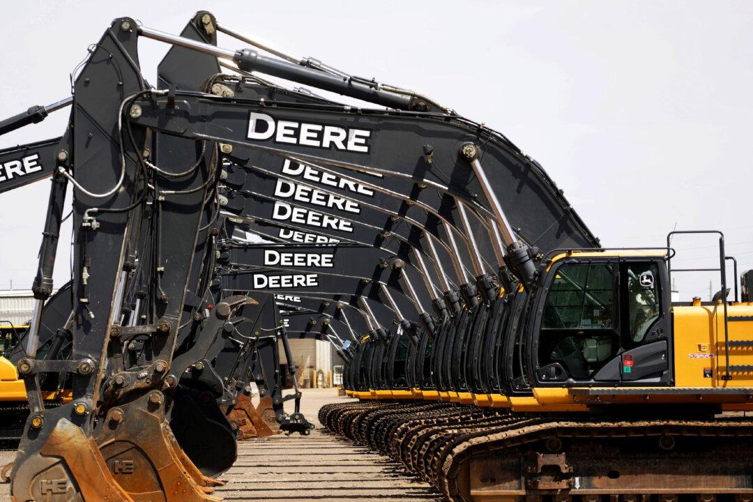 Deere Lifts Profit Forecast, but Shares Slip on Revenue Miss
