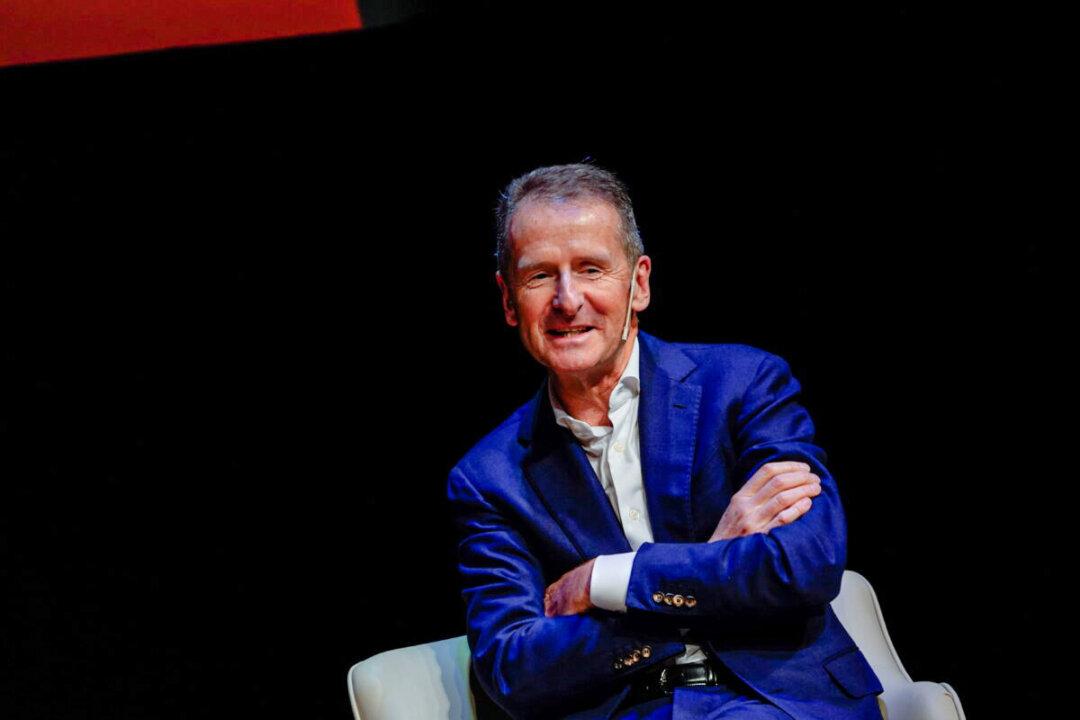 Volkswagen CEO Sees Tight Race With Tesla for E-Car Crown by 2025