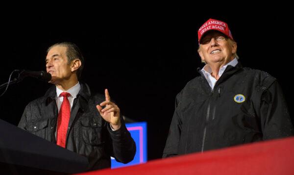 Pennsylvania Republican U.S. Senate candidate Dr. Mehmet Oz joins former President Donald Trump on stage during a rally in support of his campaign at the Westmoreland County Fairgrounds in Greensburg, Penn., on May 6, 2022. (Jeff Swensen/Getty Images)