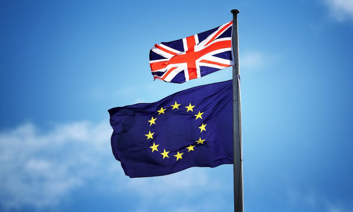 The UK's Union flag (above) and the E.U. flag flying from the same mast on March 31, 2017. (Jane Barlow/PA)