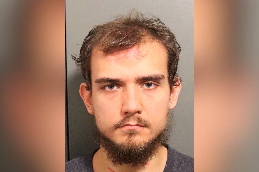 Police: Former Kansas Soccer Goalie Killed; Husband Charged