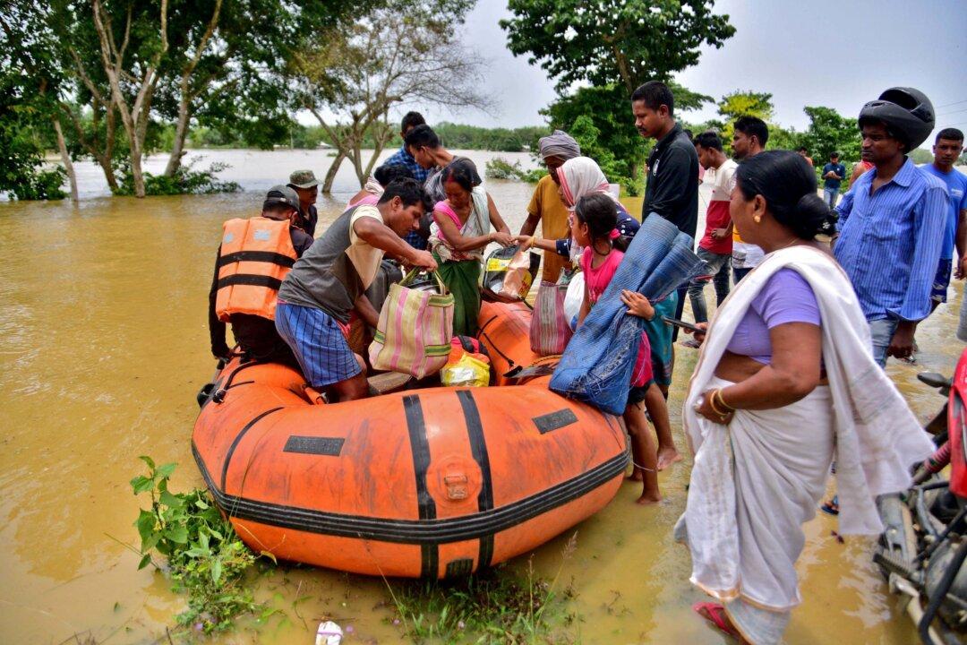 Half a Million Indians Flee Floods in Northeast Brought by Rain