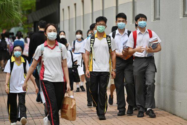 Students going to school after summer holiday in Hong Kong on Aug. 31, 2021. (Information Service Department of HKSAR)