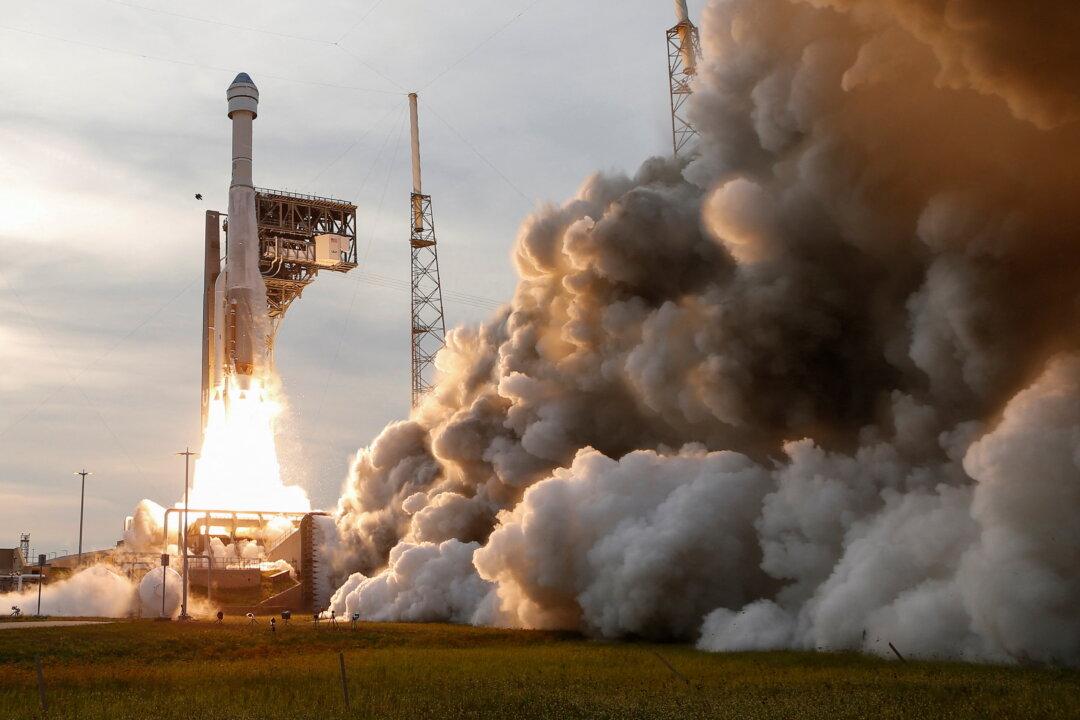 Boeing’s Starliner Capsule Docks With Space Station in Uncrewed Flight Test
