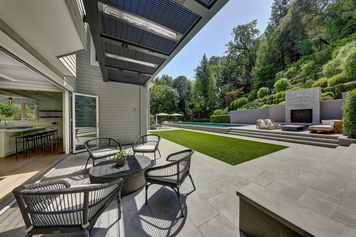 In this view, we see the magnificent surrounding gardens and woods. The property has just over two acres of beautiful, private grounds. (Jason Wells Photography and Golden Gate Creative/Tracy McLaughlin)