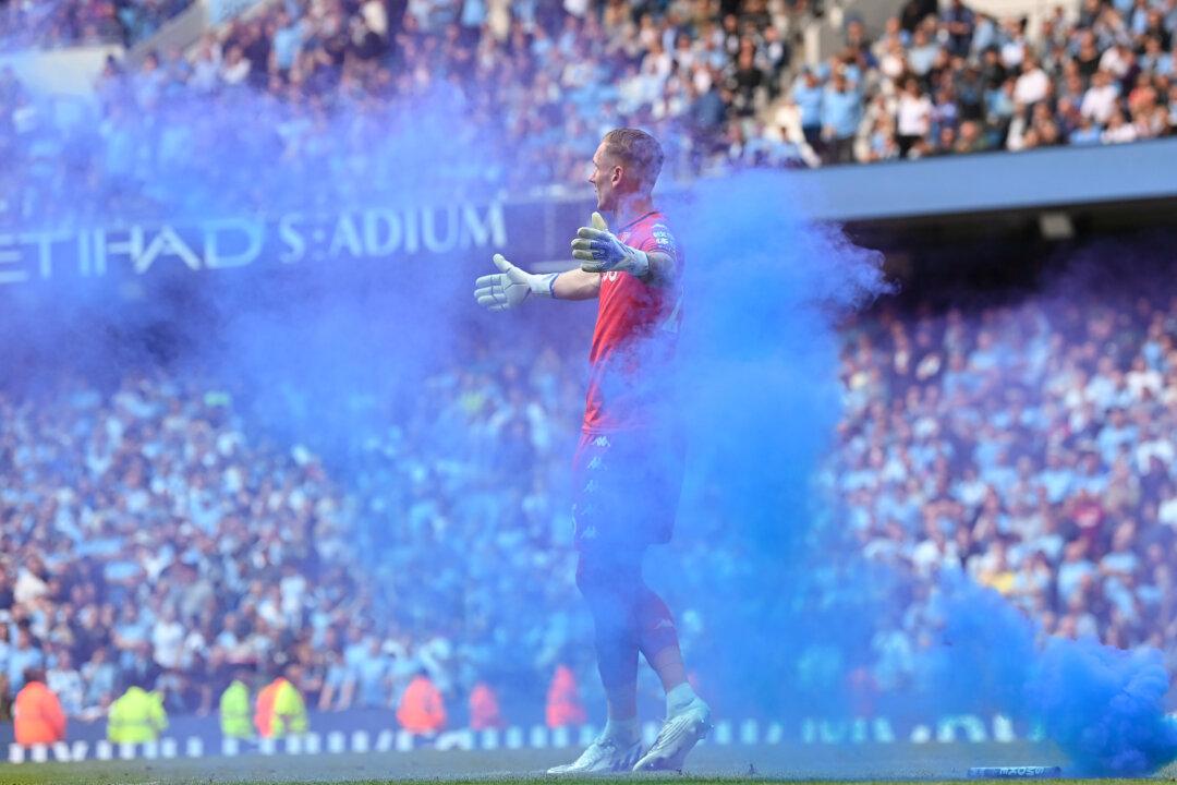 2 Manchester City Fans Charged After Thousands Invade Pitch
