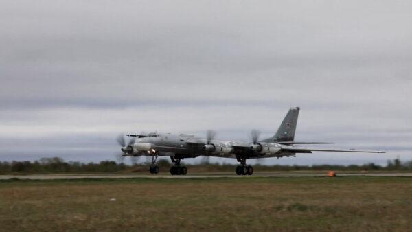 Russian Tu-95 strategic bomber takes off during Russian-Chinese military aerial exercises to patrol the Asia-Pacific region, at an unidentified location, in this still image taken from a video released on May 24, 2022. (Russian Defense Ministry/Handout via Reuters)