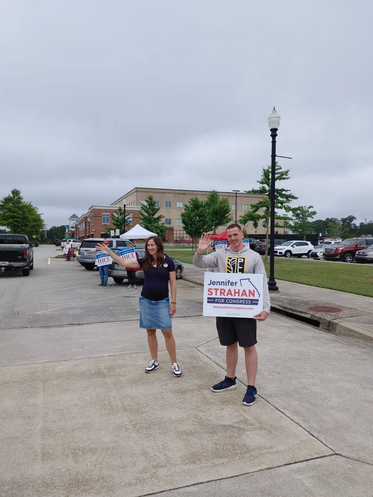 Jennifer Strahan waves to voters in Paulding County, Georgia on May 24's primary election day. (Photo by Jeff Louderback)