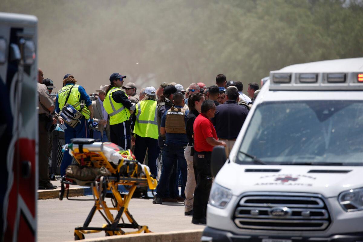 Emergency personnel gather near Robb Elementary School following a shooting, in Uvalde, Texas, on May 24, 2022. (Dario Lopez-Mills/AP Photo)