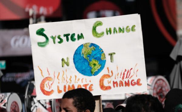 Hundreds of climate protesters walk from Times Square to New York Governor Kathy Hochul’s office to demand more action against climate change on Nov. 13, 2021, in New York. (Spencer Platt/Getty Images)