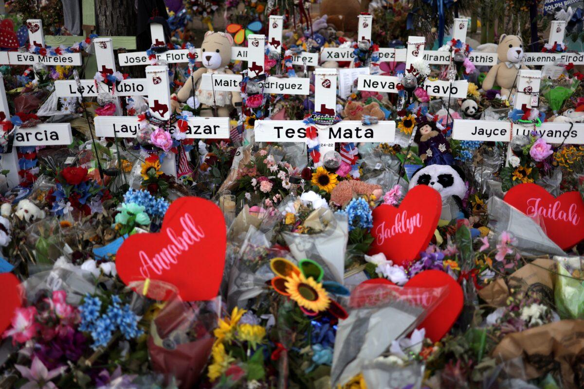Wooden crosses are placed at a memorial dedicated to the victims of the mass shooting at Robb Elementary School in Uvalde, Texas, on June 3, 2022. (Alex Wong/Getty Images)