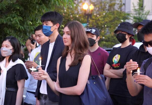 Participants at a candlelight vigil mourning victims of the 1989 Tiananmen Square in Washington D.C., on June 3, 2022. (Terri Wu/The Epoch Times)