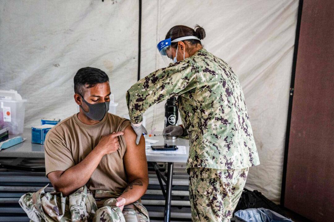Unvaccinated Navy Officer Restricted From Official Travel, Forced to Live Away from Husband for 1.5 Years