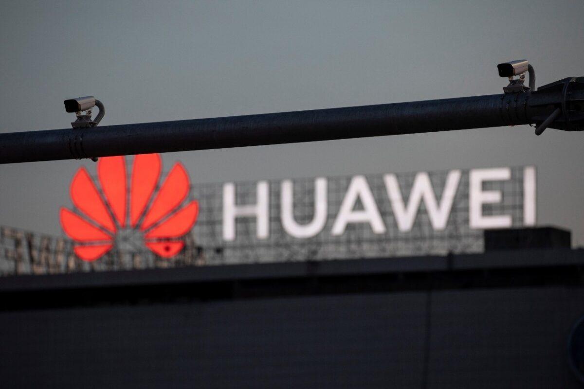 Surveillance cameras are seen in front of a Huawei logo in Belgrade, Serbia, on Aug. 11, 2020. (Marko Djurica/Reuters)