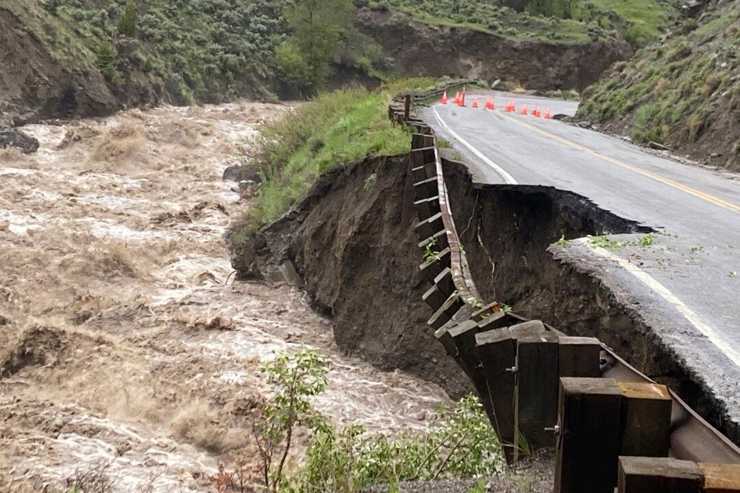 Yellowstone Floods Wipe Out Roads, Bridges, Strand Visitors