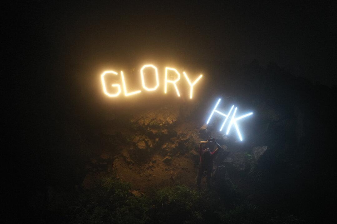 ‘Glory HK’ Seen on Top of Hong Kong’s Lion Rock