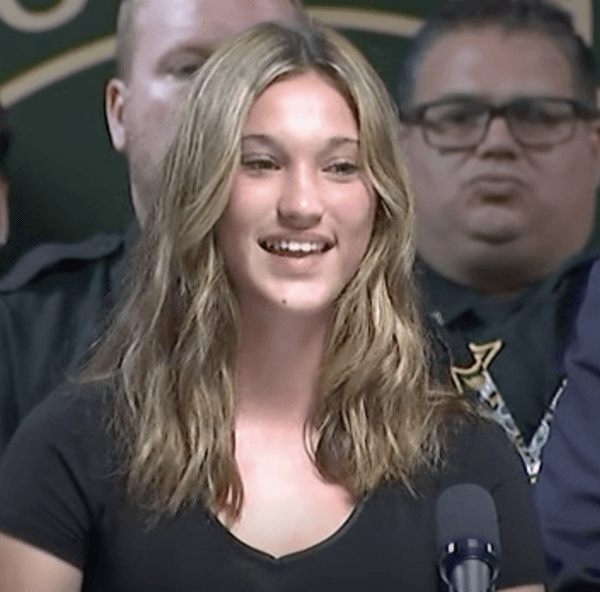 Emma Stanford, Founder of Emma Loves K-9s attends a bill signing with Florida Gov. Ron DeSantis for retired police dogs. (The Florida Channel/Screenshot via The Epoch Times)