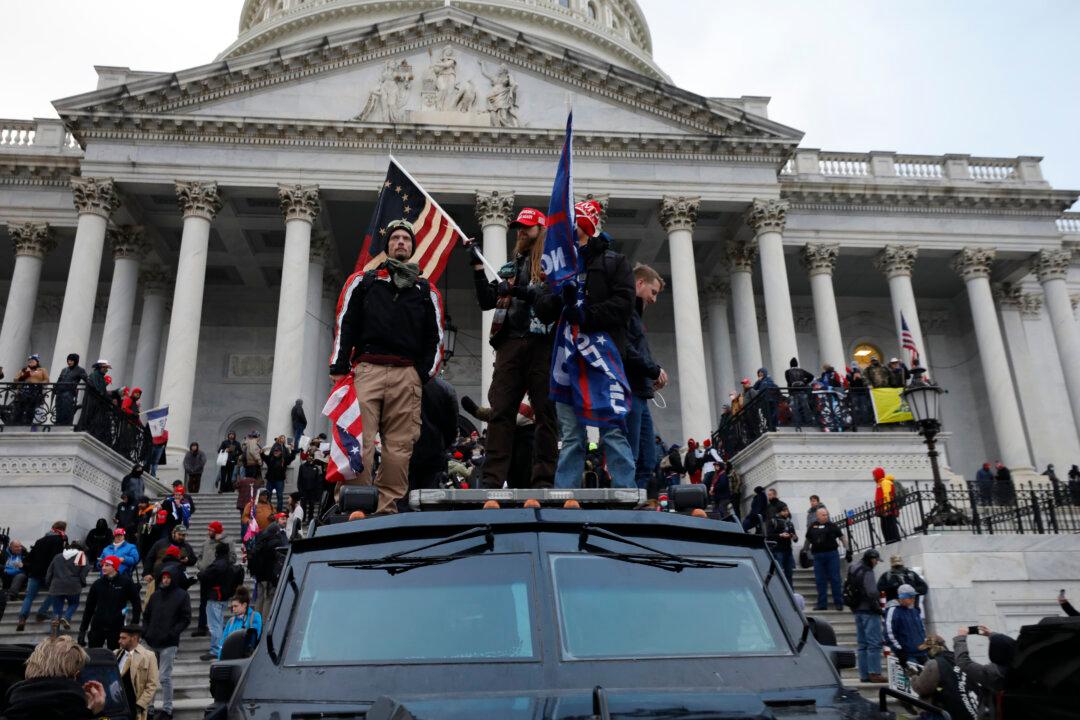 Capitol Rioter Gets 33 Months in Jail for Hitting Police With Wooden Plank
