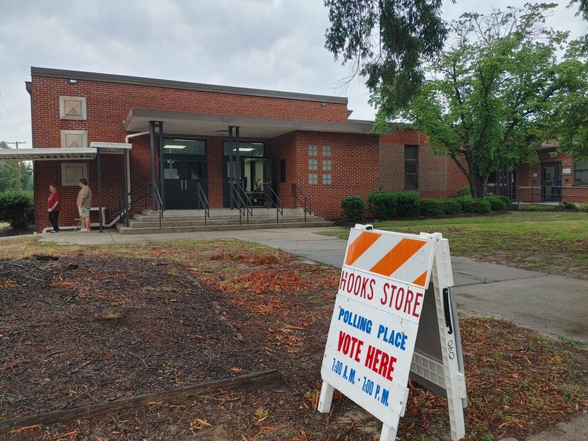 Voters in West Columbia, S.C. head to the precinct at Hook's Store on June 14. (Jeff Louderback/The Epoch Times)