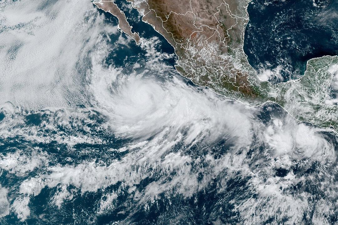 Hurricane Blas Heads out to Sea Off Southern Mexico