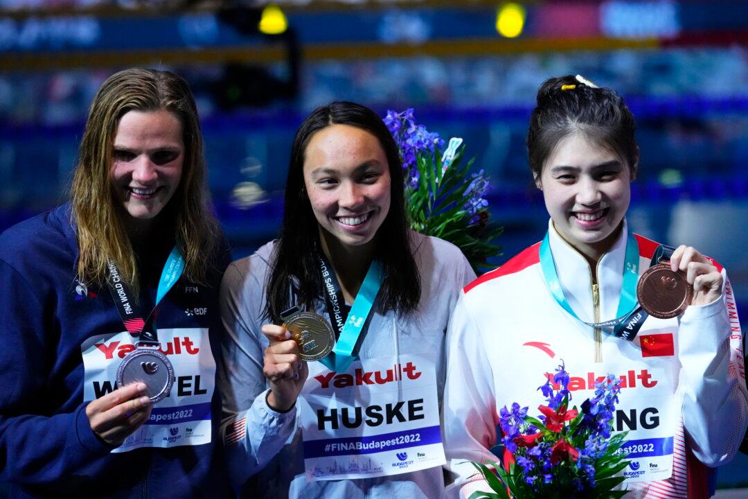 Huske, Dressel, Walsh Win More US Golds at Swimming Worlds