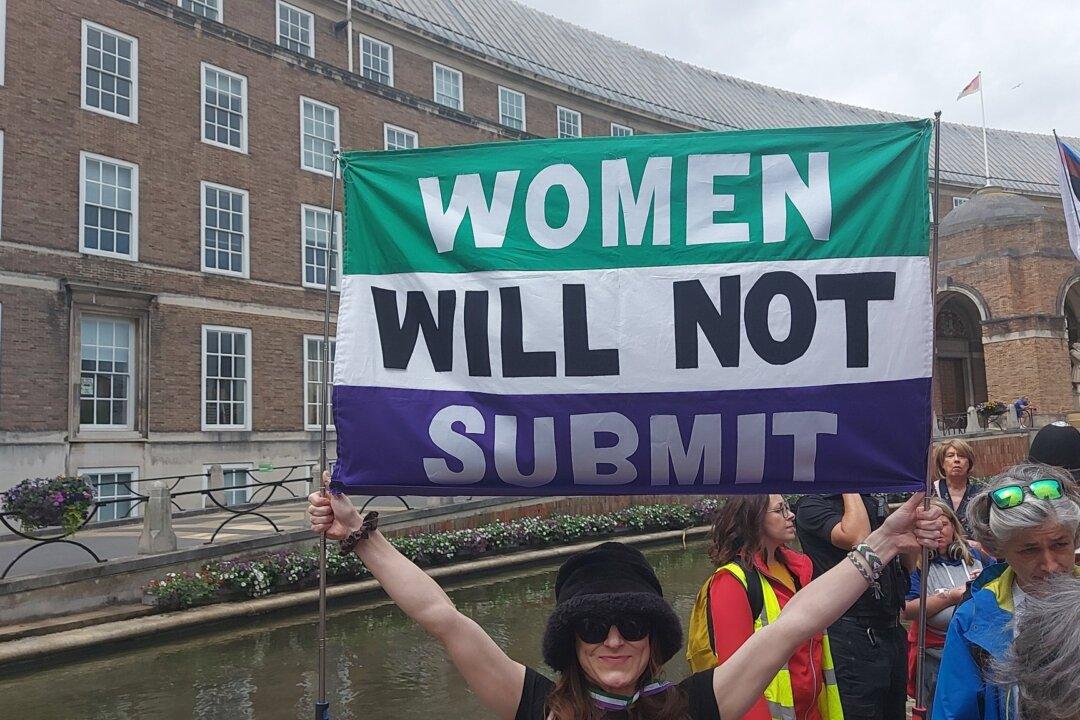 Balaclava-Clad Trans Activists Mob Women’s Group in England