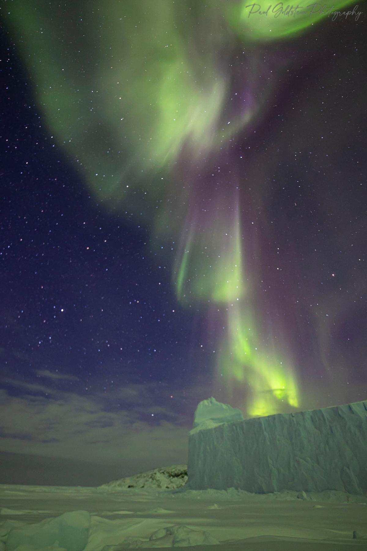 The snow glows green in Nunavut, Canada. (Courtesy of <a href="https://www.instagram.com/paulsgoldstein/">Paul Goldstein</a>)