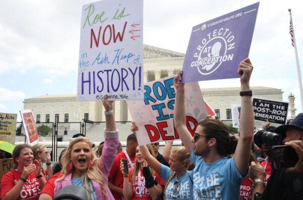 Pro-life supporters celebrate outside the Supreme Court in Washington on June 24, 2022. (Olivier Douliery/AFP via Getty Images)