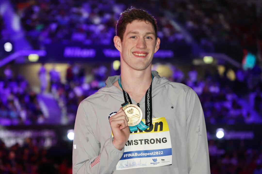 American Armstrong Takes 50m Backstroke Gold, McIntosh Wins 400m Medley
